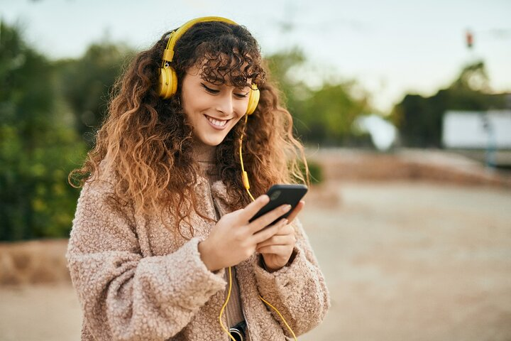 Explore Chicago's Millennium Park at your own pace discovering art and history through a personal audio guide while enjoying the beauty of this iconic urban landscape.